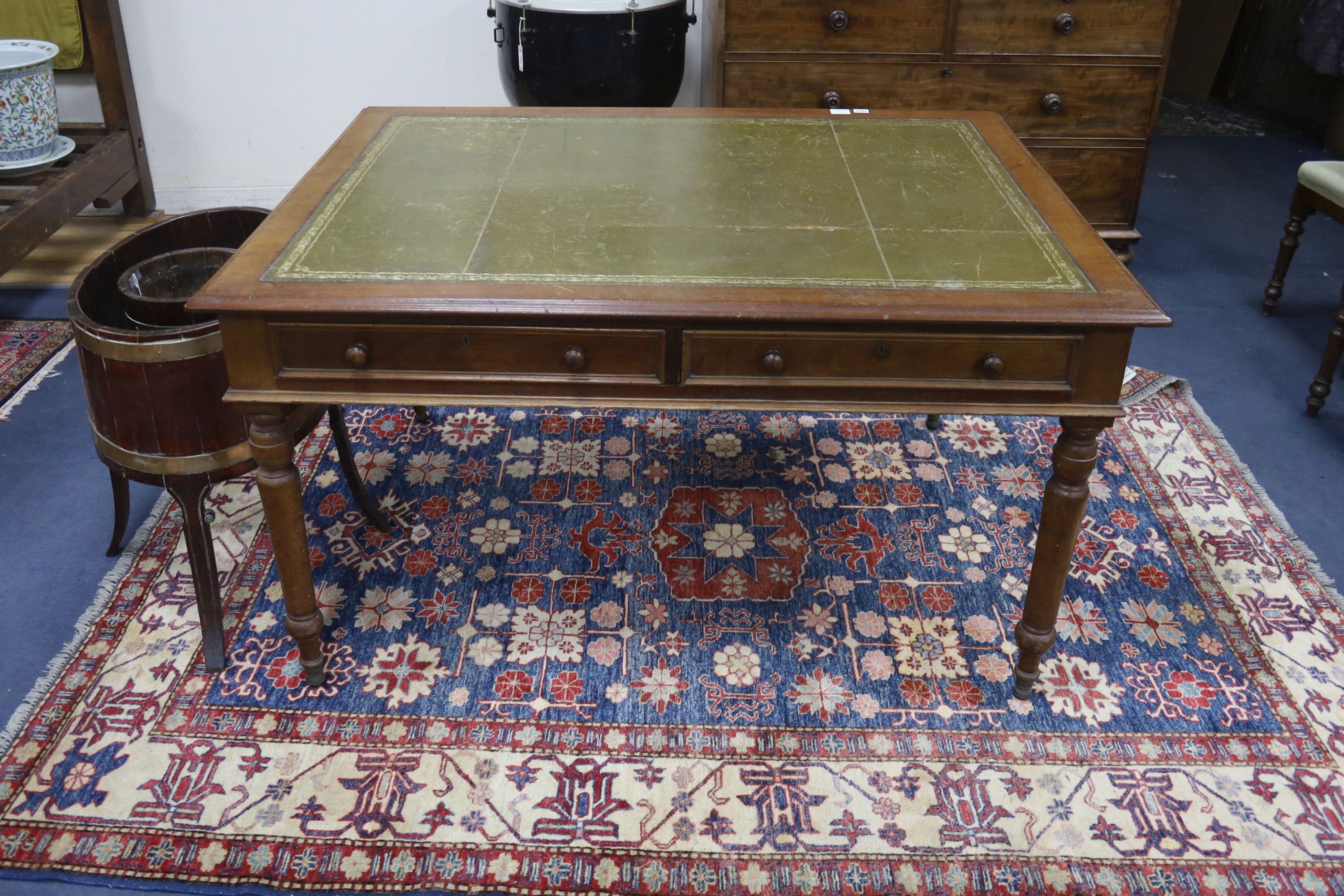 A Victorian style mahogany leather-topped partner’s desk, length 138cm, depth 106cm, height 75cm